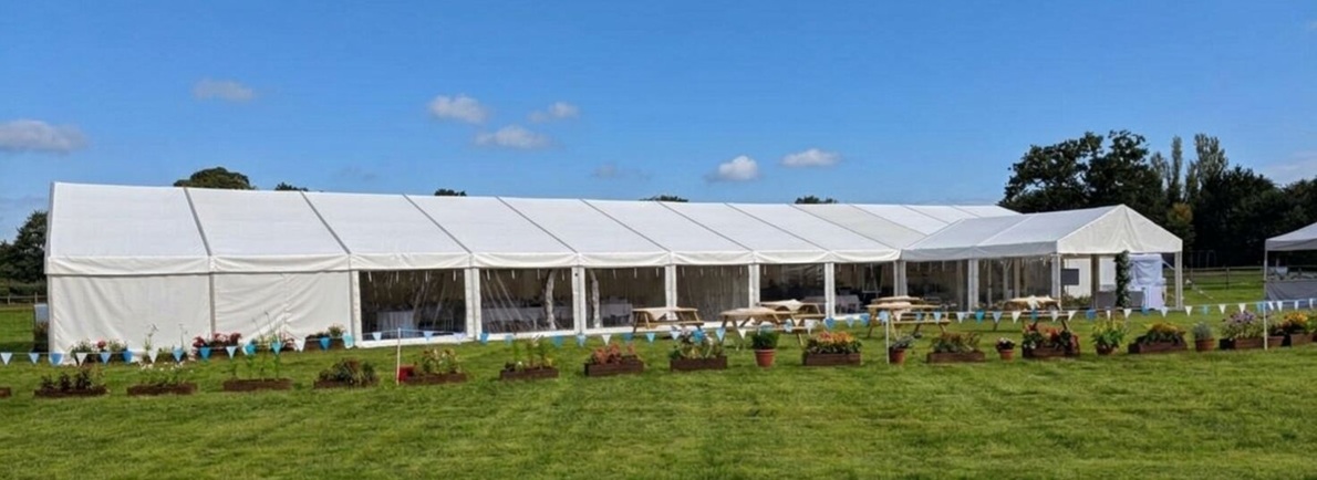 Clear span marquee installation for wedding event in Cheshire